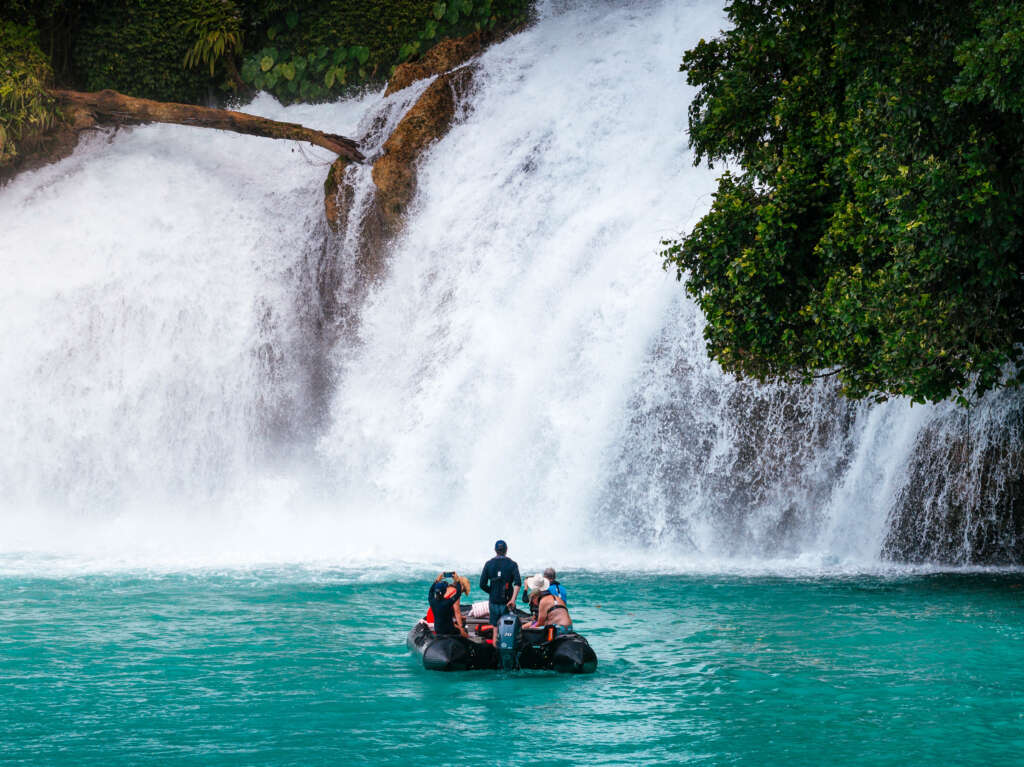 Kiti-Kiti Waterfall is in Fakfak Regency, West Papua, Indonesia. It’s a remote waterfall famous for flowing directly into the sea, near the Nusalasi Bay Coastal Park Conservation Area. Visitors usually reach it by boat from Fakfak.