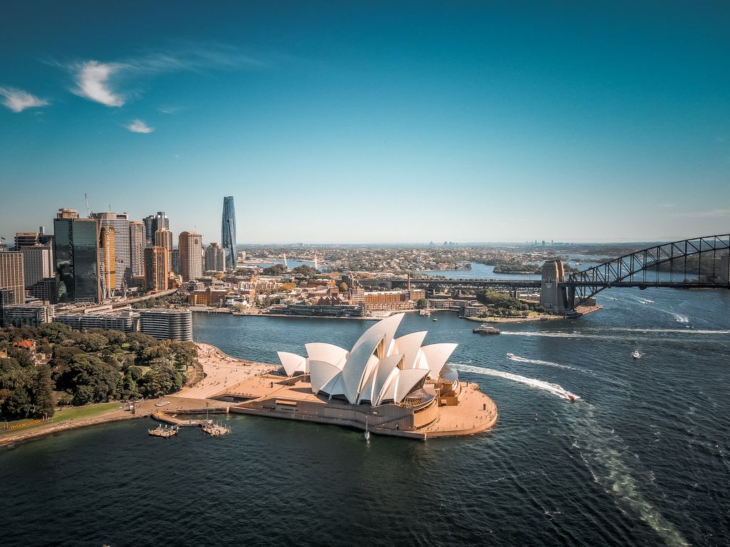 Aerial view of the Sydney Opera House with the city skyline and Sydney Harbour Bridge